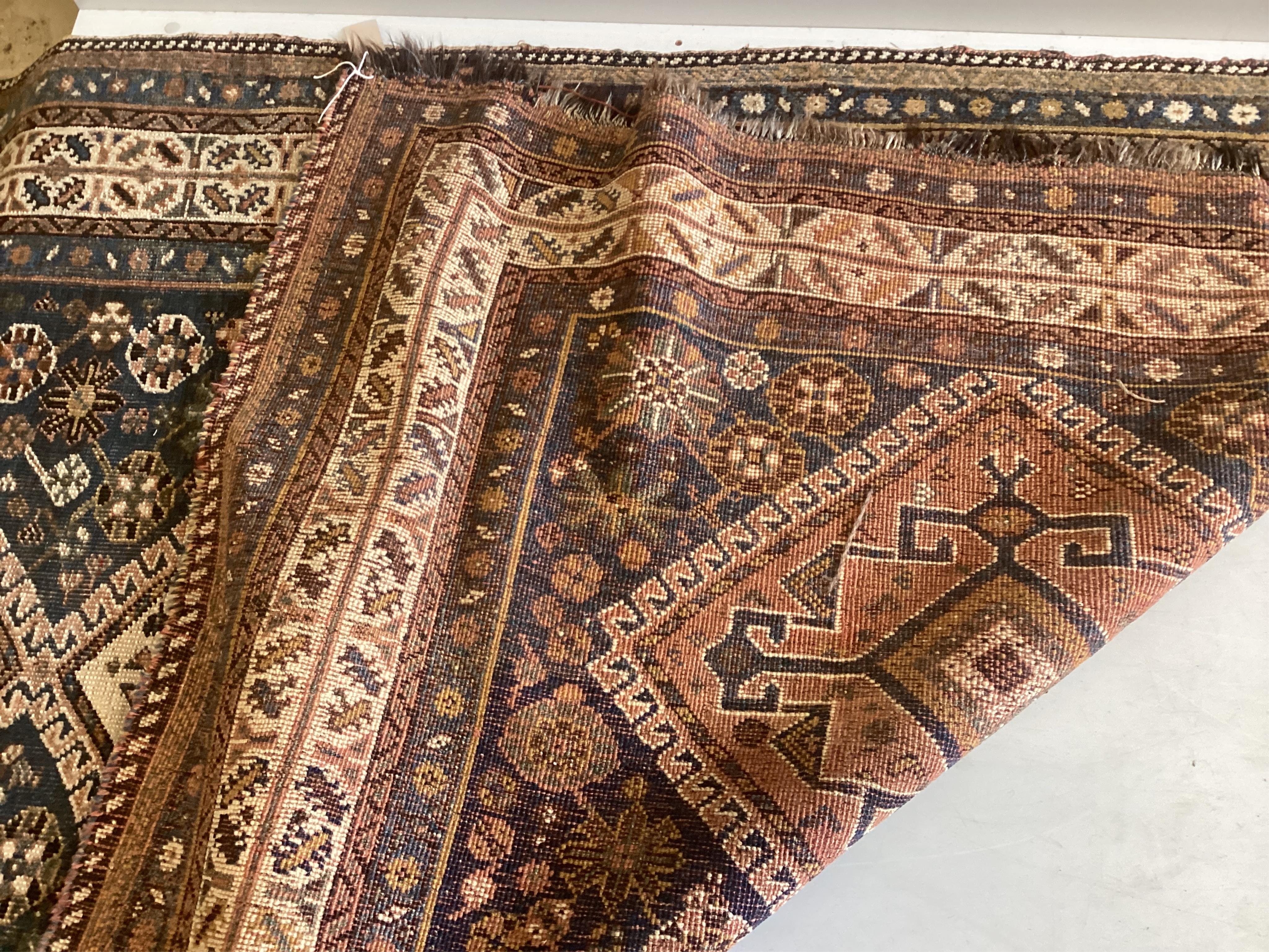 A Caucasian Kazak blue ground rug, 220 x 143cm. Condition - fair